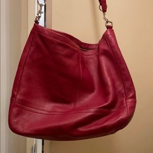 Red leather coach handbag